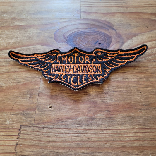 Vintage Harley Wing Logo ( Version Black & Orange)